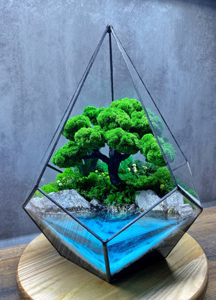 Preserved moss glass terrarium In the drop