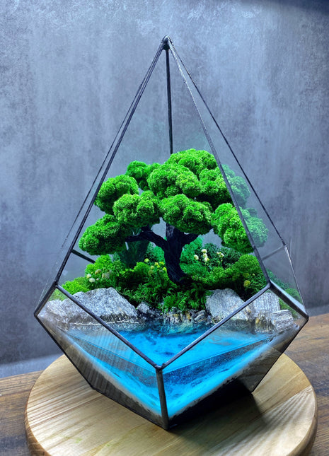 Preserved moss glass terrarium In the drop