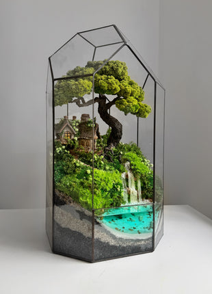 Terrarium with cottage bonsai and glowing waterfall Forest Haven