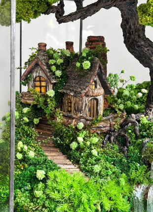 Terrarium with cottage bonsai and glowing waterfall Forest Haven