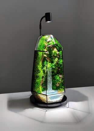 Modern glass terrarium with preserved moss, glowing pond & lamp  Handmade, maintenance-free decor — perfect for home or office!