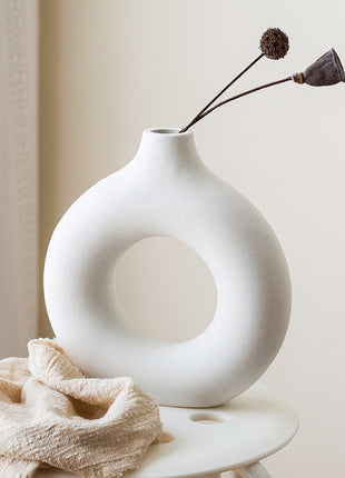Minimalist White Circle Vase, a perfect blend of modern ceramic artistry and contemporary design