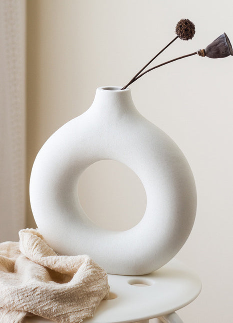 Minimalist White Circle Vase, a perfect blend of modern ceramic artistry and contemporary design