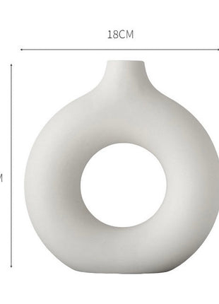 Minimalist Circle Vase, a perfect blend of modern ceramic artistry and contemporary design