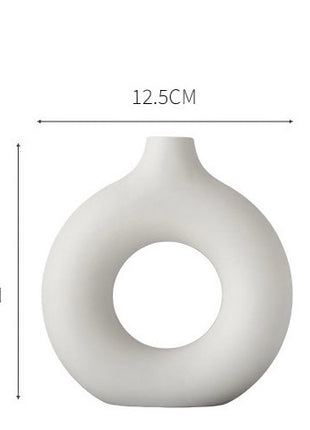 White Circle Vase, a perfect blend of modern ceramic artistry and contemporary design