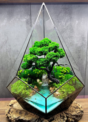 Preserved moss crystal glass terrarium In the drop with waterfall