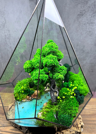 Crystal glass terrarium In the drop with waterfall and preserved moss