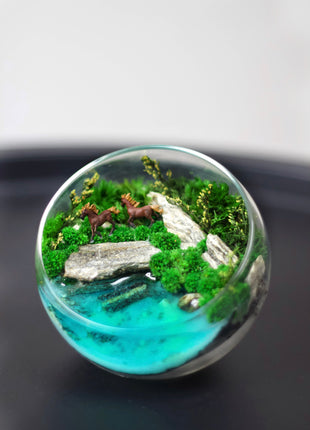 Unique preserved moss terrarium that glows in the dark with horses