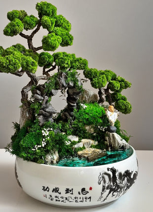 Artistic bonsai decor with preserved moss, glowing pond and meditating monk — handmade interior piece