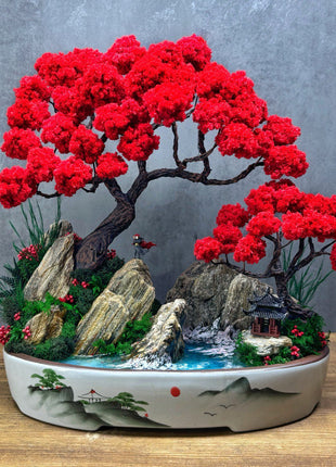 Side view of red bonsai trees with pagoda, rocks and epoxy river