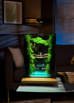 Terrarium "Forest Canyon" with preserved moss and a loving couple on a bridge with a lamp.