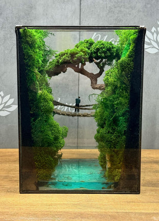 Terrarium "Forest Canyon" with preserved moss and a loving couple on a bridge with a lamp.