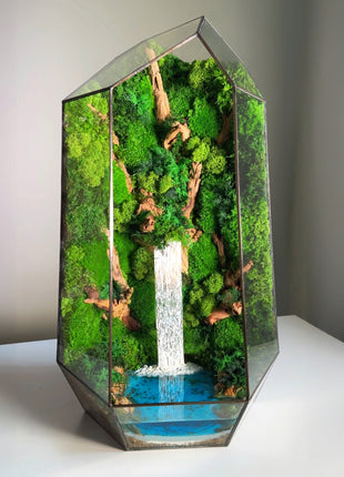 Glass terrarium with forest waterfall and preserved moss Minimalism