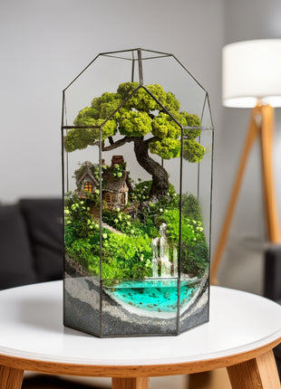 Handmade terrarium with preserved moss and glowing resin waterfall